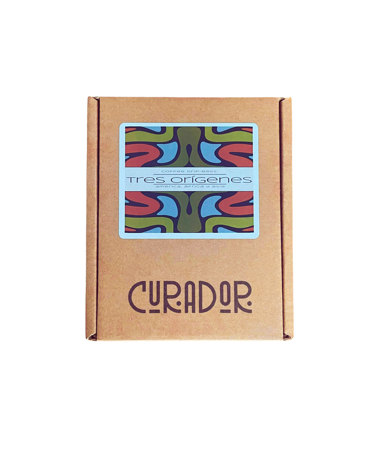 Caja de regalo Curador con diseño colorido y logo para experiencias y cafés de especialidad.