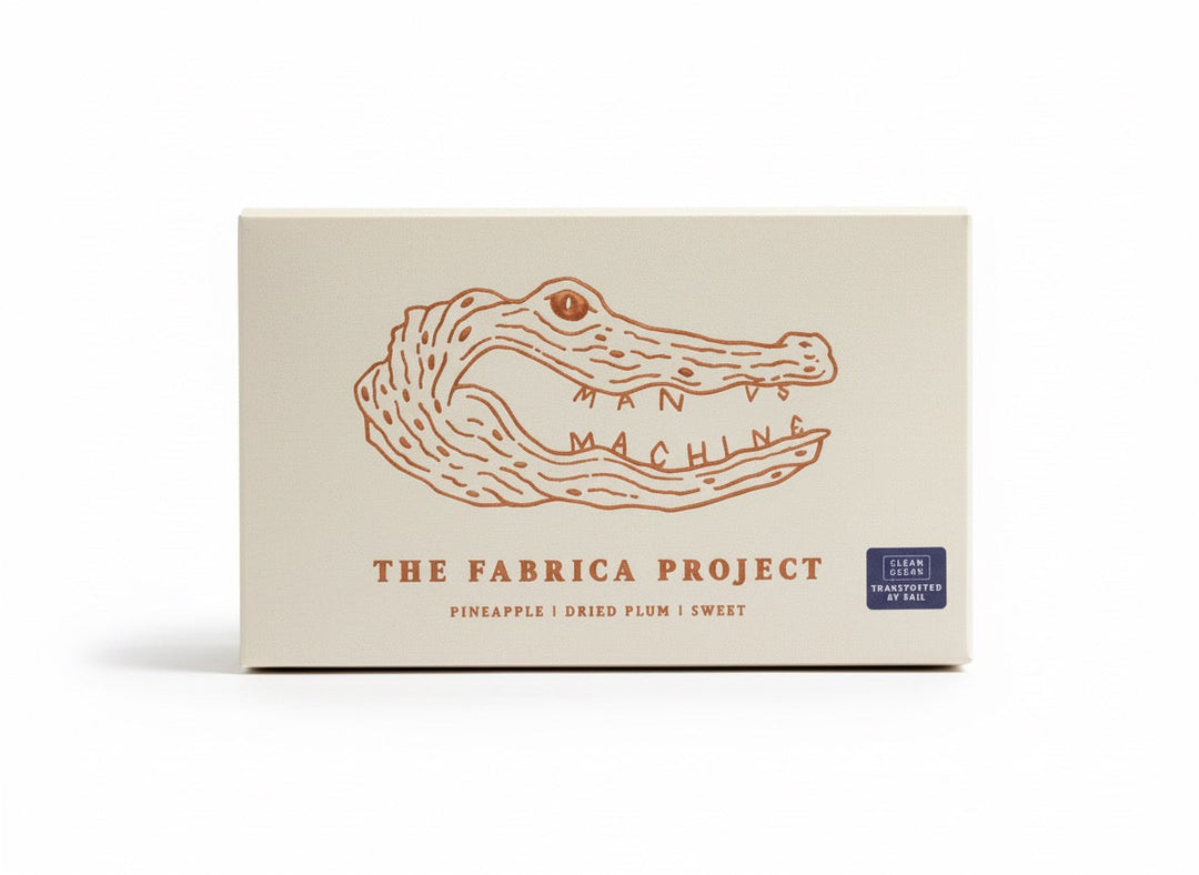 Paquete de café Colombia La Fábrica tostado en Múnich con notas a piña, ciruela pasa y dulce, ideal para italiana, Aeropress y filtro.