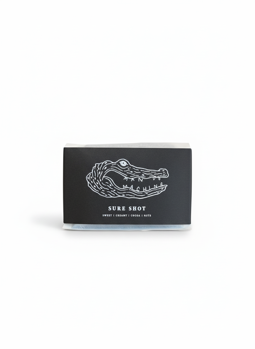 Paquete de café Brasil Sure Shot tostado en Múnich con notas dulces, cremosas, cacao y nueces, ideal para espresso, moka italiana y prensa francesa.